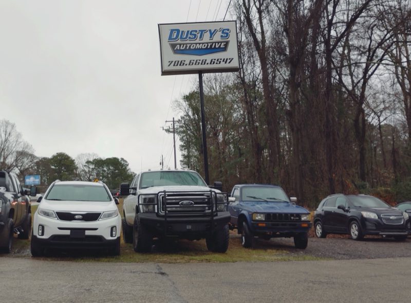 Dusty's Automotive sign on W Point Rd